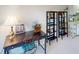 Home office space with a desk, shelves, and a bright atmosphere at 305 30Th W Ave # A308, Bradenton, FL 34205