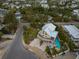 A-frame home with pool, deck, and lush landscaping at 315 Hammock Cir, Anna Maria, FL 34216