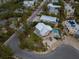 A-frame home with private driveway and tropical landscaping at 315 Hammock Cir, Anna Maria, FL 34216