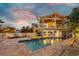 Two-story home with pool, spa, and expansive patio at 315 Hammock Cir, Anna Maria, FL 34216