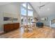 Bright and airy living room with hardwood floors, large windows and stylish furnishings at 315 Hammock Cir, Anna Maria, FL 34216