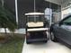 Golf cart parked near home at 322 Blackburn Blvd, North Port, FL 34287