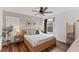 Light and airy bedroom with a king-size bed at 3409 Anchor Bay Trl, Lakewood Ranch, FL 34211
