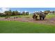 Nature-inspired playground with wood features at 3409 Anchor Bay Trl, Lakewood Ranch, FL 34211