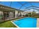 Relaxing screened-in pool and patio area at 3409 Anchor Bay Trl, Lakewood Ranch, FL 34211