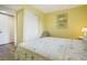 Bedroom with queen bed, light walls, and wood flooring at 3622 Lake Bayshore Dr # K302, Bradenton, FL 34205