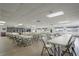 Large community room with tables and chairs at 3622 Lake Bayshore Dr # K302, Bradenton, FL 34205