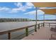 Relaxing community dock features shaded seating overlooking the lake at 3622 Lake Bayshore Dr # K302, Bradenton, FL 34205