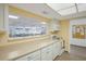 Community kitchen with ample counter space and appliances at 3622 Lake Bayshore Dr # K302, Bradenton, FL 34205
