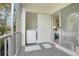Convenient laundry room with washer and dryer on screened porch at 3622 Lake Bayshore Dr # K302, Bradenton, FL 34205