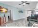Spacious living room with large TV and comfy seating at 3622 Lake Bayshore Dr # K302, Bradenton, FL 34205