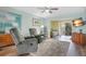 Comfortable living room with two recliners and a large rug at 3622 Lake Bayshore Dr # K302, Bradenton, FL 34205