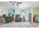 Relaxing living room with two comfy recliners and a view at 3622 Lake Bayshore Dr # K302, Bradenton, FL 34205