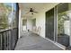 Spacious screened-in balcony with ample seating and storage at 3622 Lake Bayshore Dr # K302, Bradenton, FL 34205