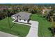Aerial view showcasing house and driveway at 3850 Skyway Ave, North Port, FL 34288