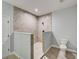 Spa-like bathroom with walk-in shower and toilet at 3850 Skyway Ave, North Port, FL 34288
