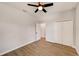 Bright bedroom with ceiling fan and double door closet at 3850 Skyway Ave, North Port, FL 34288