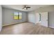 Spacious bedroom with hardwood floors and large window at 3850 Skyway Ave, North Port, FL 34288