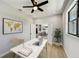 Bright home office features built-in workspace and view into dining area at 3850 Skyway Ave, North Port, FL 34288