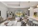 Living room with view to backyard through sliding doors at 3850 Skyway Ave, North Port, FL 34288