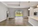 Bright living room with sliding glass doors leading to the backyard at 3850 Skyway Ave, North Port, FL 34288