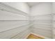 Empty pantry with white wire shelving, offering ample storage at 3850 Skyway Ave, North Port, FL 34288