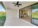 Covered patio with view of backyard and access to kitchen at 3850 Skyway Ave, North Port, FL 34288
