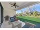 Relaxing patio with outdoor furniture and lush green lawn at 3850 Skyway Ave, North Port, FL 34288