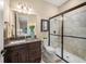 Bathroom with granite vanity, shower, and toilet at 3904 Waypoint Ave, Osprey, FL 34229