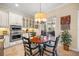 Charming breakfast nook with round table and seating for four at 3904 Waypoint Ave, Osprey, FL 34229