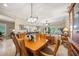 Bright dining area with wood table and chairs at 3904 Waypoint Ave, Osprey, FL 34229
