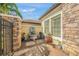 Inviting front courtyard with fountain, brickwork, and lush landscaping at 3904 Waypoint Ave, Osprey, FL 34229