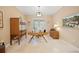 Bright home office with built-in wooden cabinets and large window at 3904 Waypoint Ave, Osprey, FL 34229