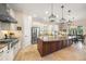 Spacious kitchen featuring granite countertops and stainless steel appliances at 3904 Waypoint Ave, Osprey, FL 34229