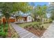Landscaped front yard with walkway leading to a renovated bungalow at 4536 1St N Ave, St Petersburg, FL 33713