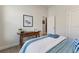 Bedroom with wooden side table and window at 4697 Antrim Dr, Sarasota, FL 34240