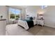 Relaxing bedroom with a plush bed and large window at 4697 Antrim Dr, Sarasota, FL 34240