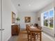 Dining room with a long wooden table at 4697 Antrim Dr, Sarasota, FL 34240