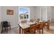 Dining room with farmhouse style table at 4697 Antrim Dr, Sarasota, FL 34240