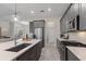 Modern kitchen with stainless steel appliances and a large island at 4697 Antrim Dr, Sarasota, FL 34240