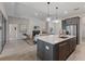 Spacious kitchen with island, stainless steel appliances, and open layout at 4697 Antrim Dr, Sarasota, FL 34240