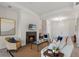 Bright living room features a fireplace and comfortable seating at 4697 Antrim Dr, Sarasota, FL 34240