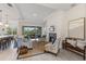 Spacious living room with fireplace and access to backyard at 4697 Antrim Dr, Sarasota, FL 34240