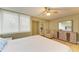 Spacious bedroom with a comfortable bed and dresser at 4918 25Th W St # 102, Bradenton, FL 34207