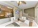 Dining area with white table and stairs leading to the second floor at 4918 25Th W St # 102, Bradenton, FL 34207