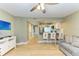 Open kitchen with breakfast bar, stainless steel appliances, and white shaker cabinets at 4918 25Th W St # 102, Bradenton, FL 34207