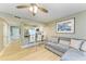 Open concept kitchen and living area with breakfast bar and modern finishes at 4918 25Th W St # 102, Bradenton, FL 34207