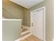 Light-colored stairs leading to the second floor of the condo at 4918 25Th W St # 102, Bradenton, FL 34207