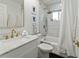 Modern bathroom with marble finishes, gold fixtures and a walk-in shower at 5107 86Th Street W Ct, Bradenton, FL 34210