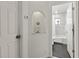 Clean bathroom with marble vanity, bathtub shower combo, and updated fixtures at 5107 86Th Street W Ct, Bradenton, FL 34210